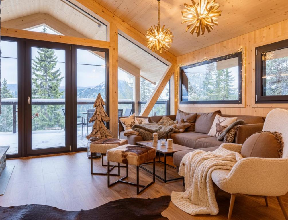 Posezení v ubytování Naturchalets Turracher Höhe by ALPS RESORTS