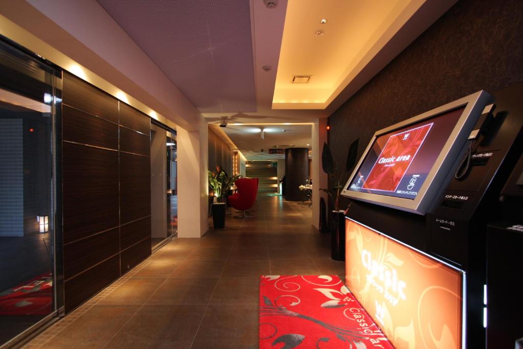 TV a/nebo společenská místnost v ubytování HOTEL W-PREMIUM -W GROUP HOTELS and RESORTS-