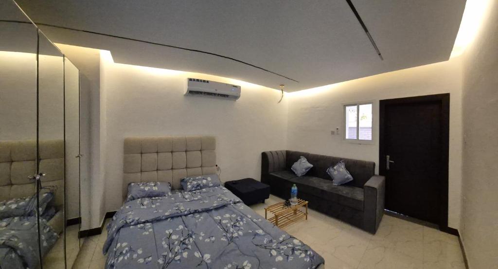 Et opholdsområde på ميرا للشقق الفندقية