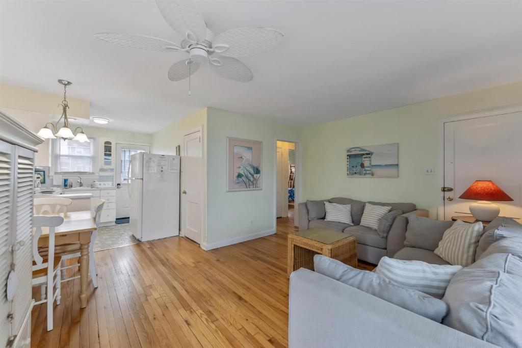 a living room with a couch and a table and a kitchen at 308A E Heather Rd, #3081 in Wildwood Crest