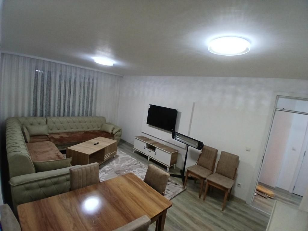 TV a/nebo společenská místnost v ubytování Banes moderne ne qender