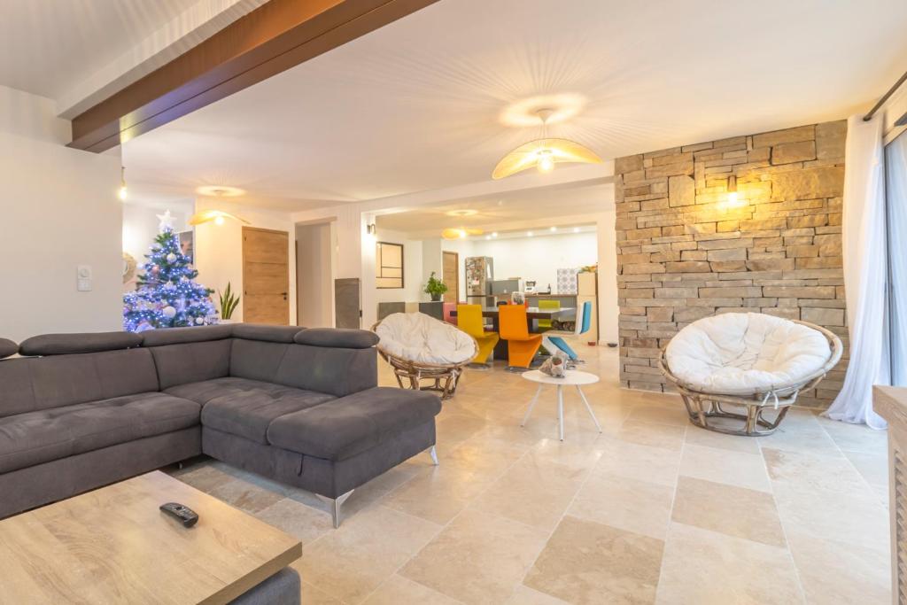 Posezení v ubytování chambre avec salle de bain privative