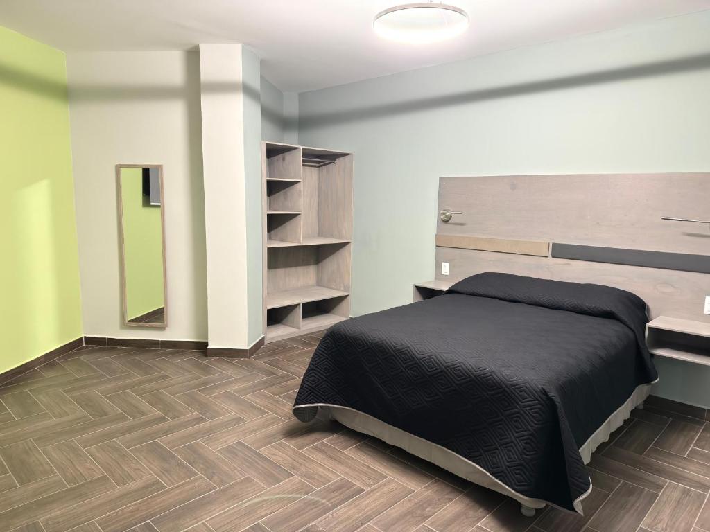 Postel nebo postele na pokoji v ubytování Hotel Azomali plus