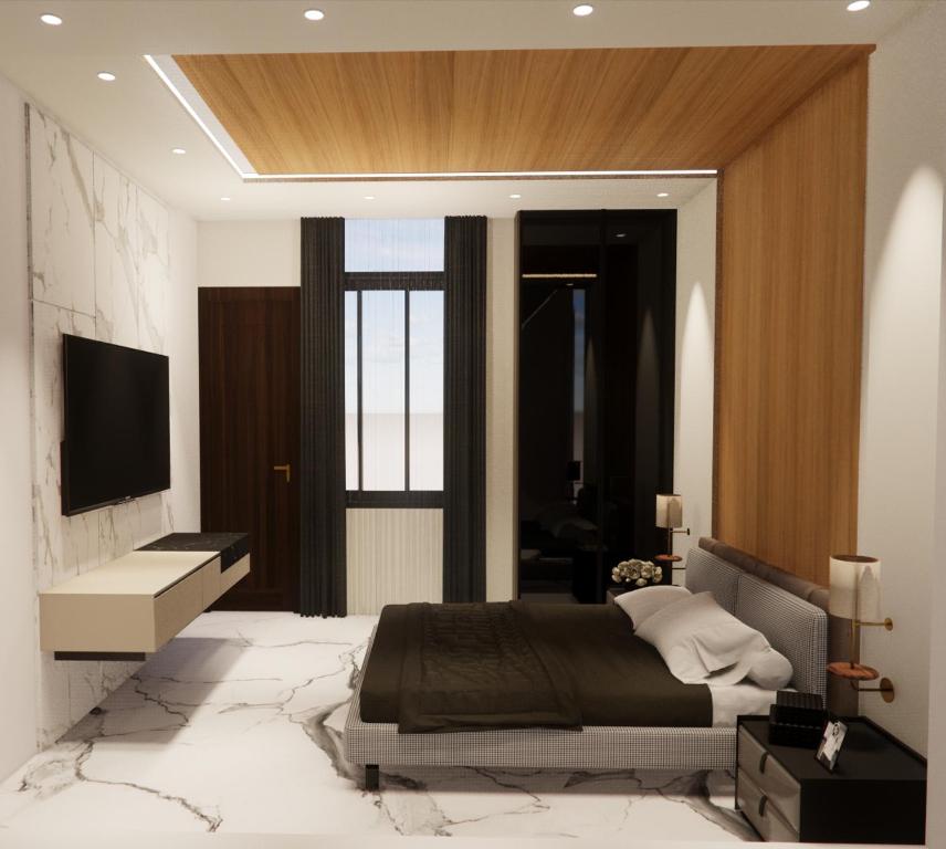 Giường trong phòng chung tại Hotel Airport Stay Zone