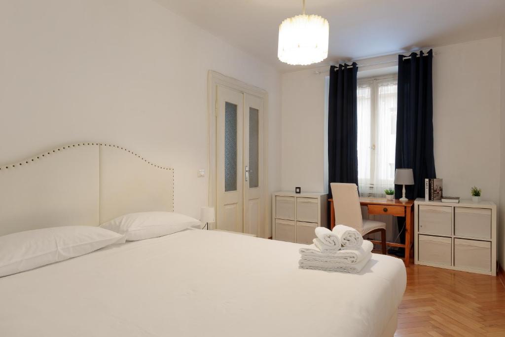 En eller flere senge i et værelse på Trieste da vivere, la tua casa in centro con WiFi