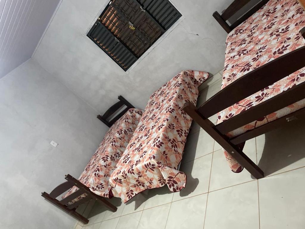 an overhead view of two bunk beds in a room at Casa Aurora in Chapada dos Guimarães
