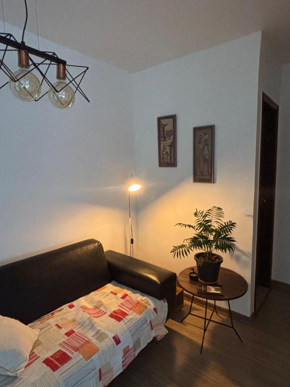 Ένα ή περισσότερα κρεβάτια σε δωμάτιο στο Apartamento Sofisticado na Freguesia