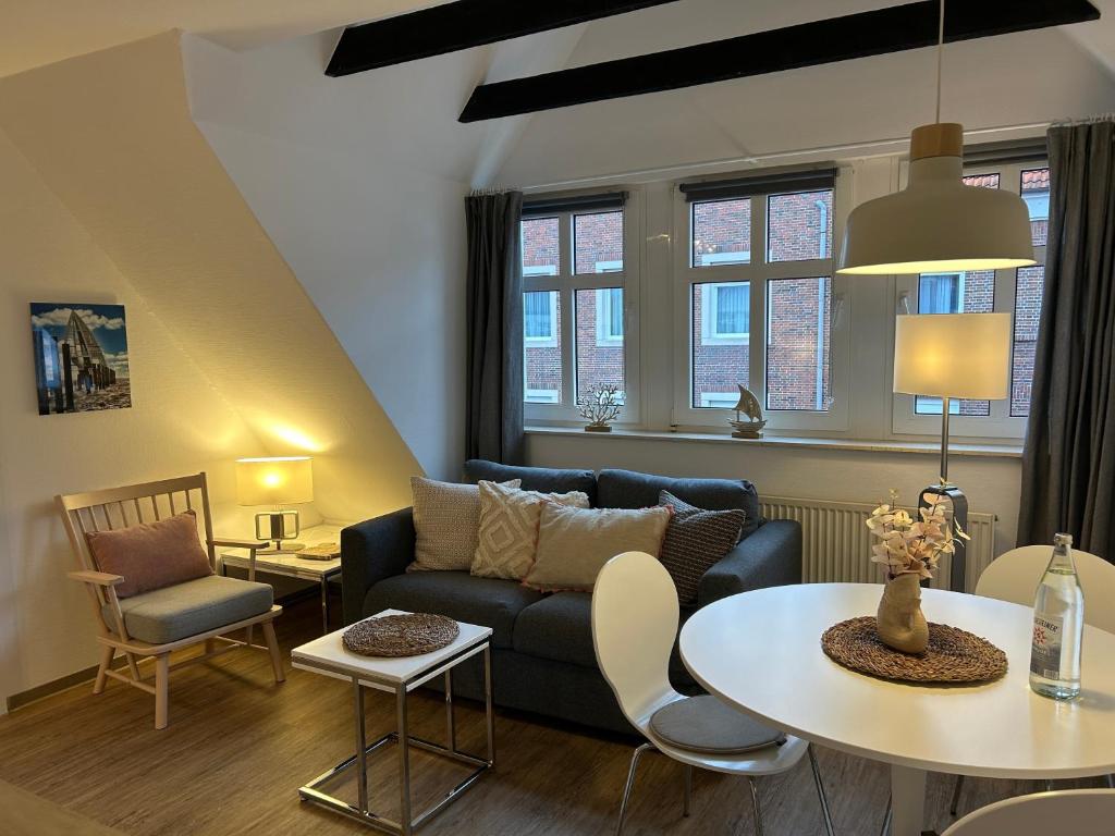 Posezení v ubytování Ferienwohnung juist strandburg 307 mit Schwimmbad und Sauna