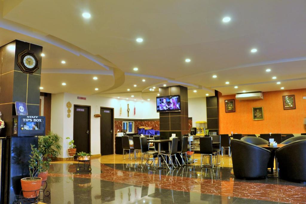TV o dispositivi per l'intrattenimento presso Hotel City Inn - Mountain View