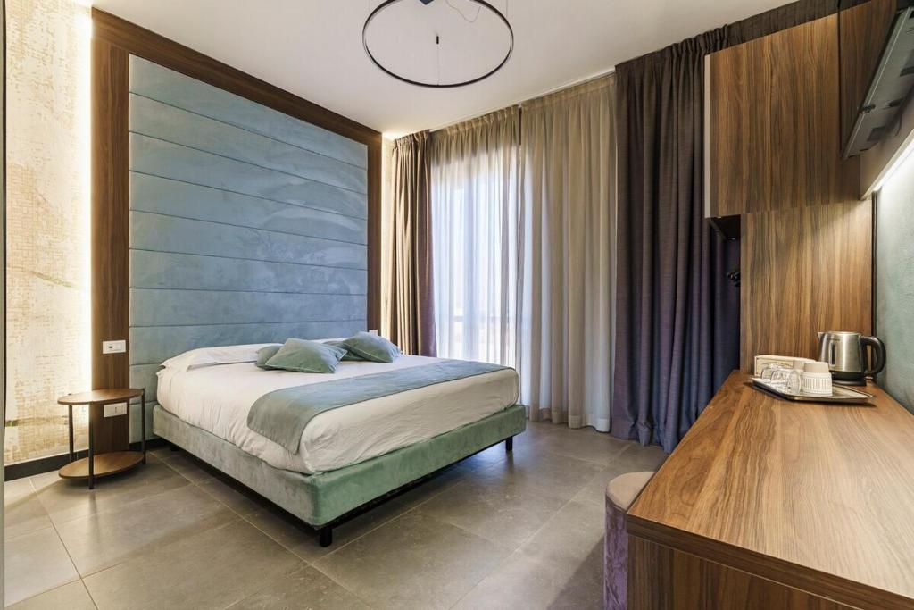 Giường trong phòng chung tại Fashion House