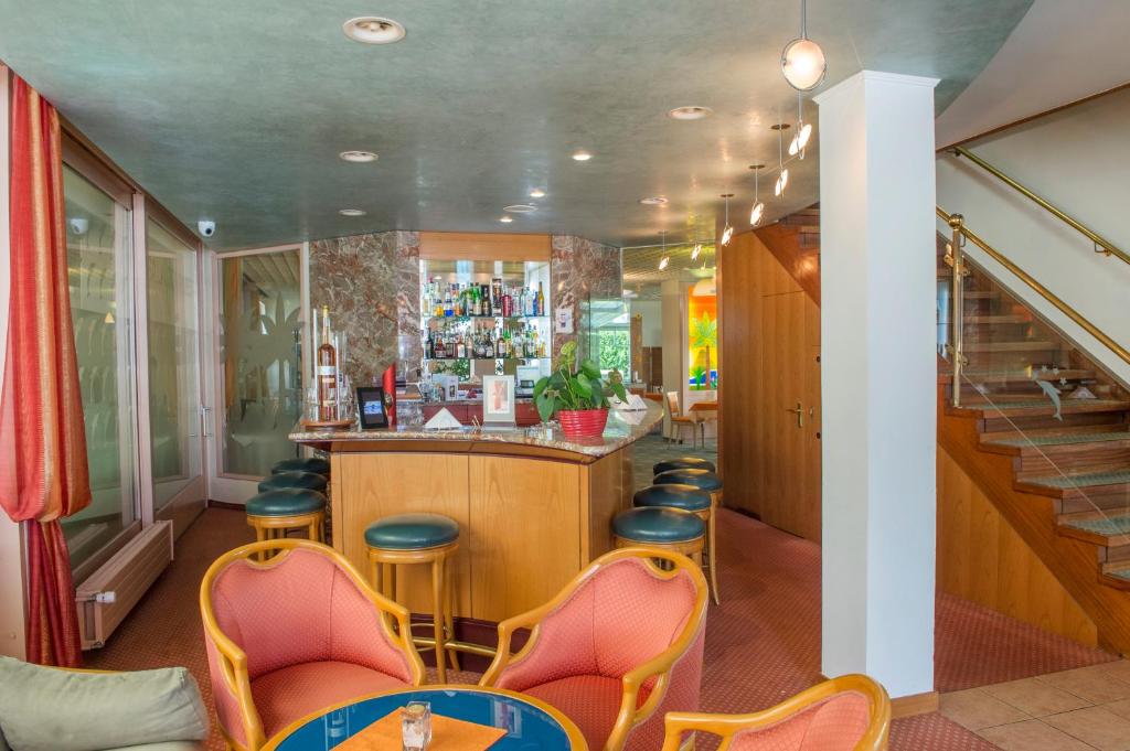 A seating area at Hotel Delfino Lugano