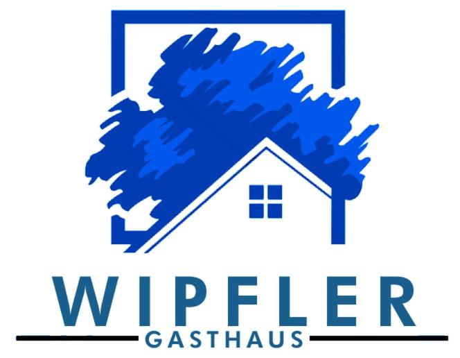 un logo di un albero davanti a una casa di Gasthaus Wipfler a Villenbach