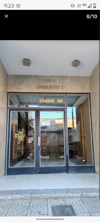 a store front of a building with glass doors at Alas termas in Termas de Río Hondo