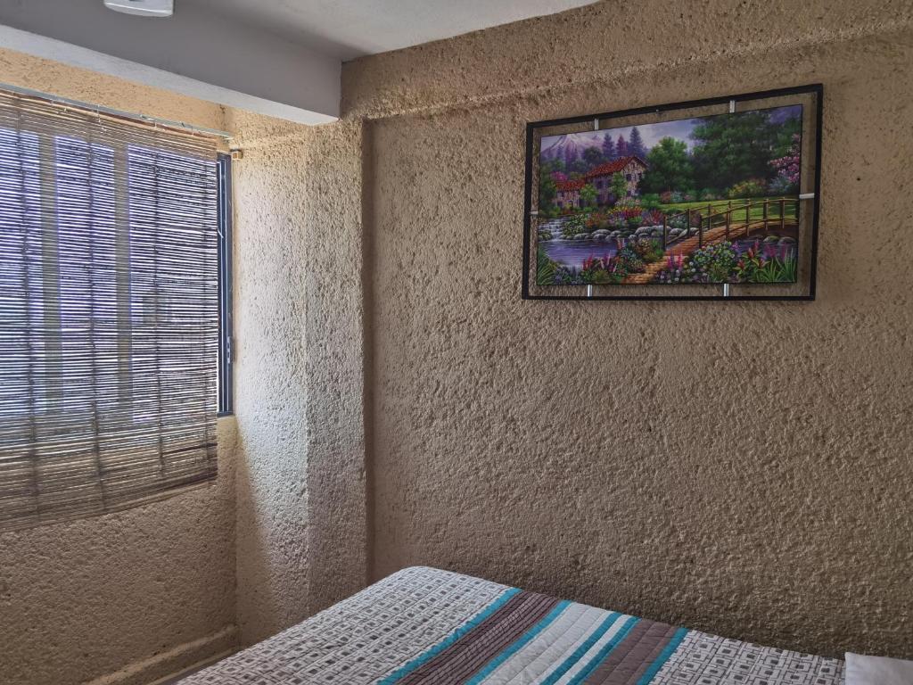 Postel nebo postele na pokoji v ubytování Casa Aca