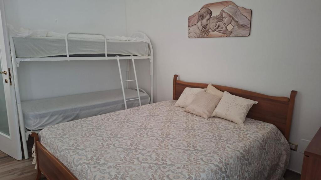 En eller flere senge i et værelse på La Casa di Marì