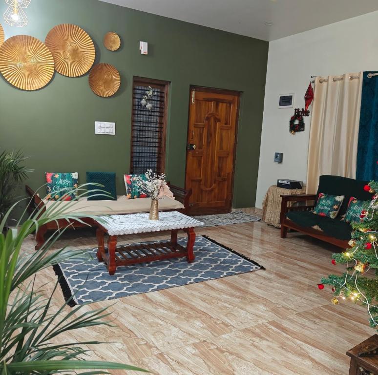 Et opholdsområde på Nature Chirps Coorg farmview villa