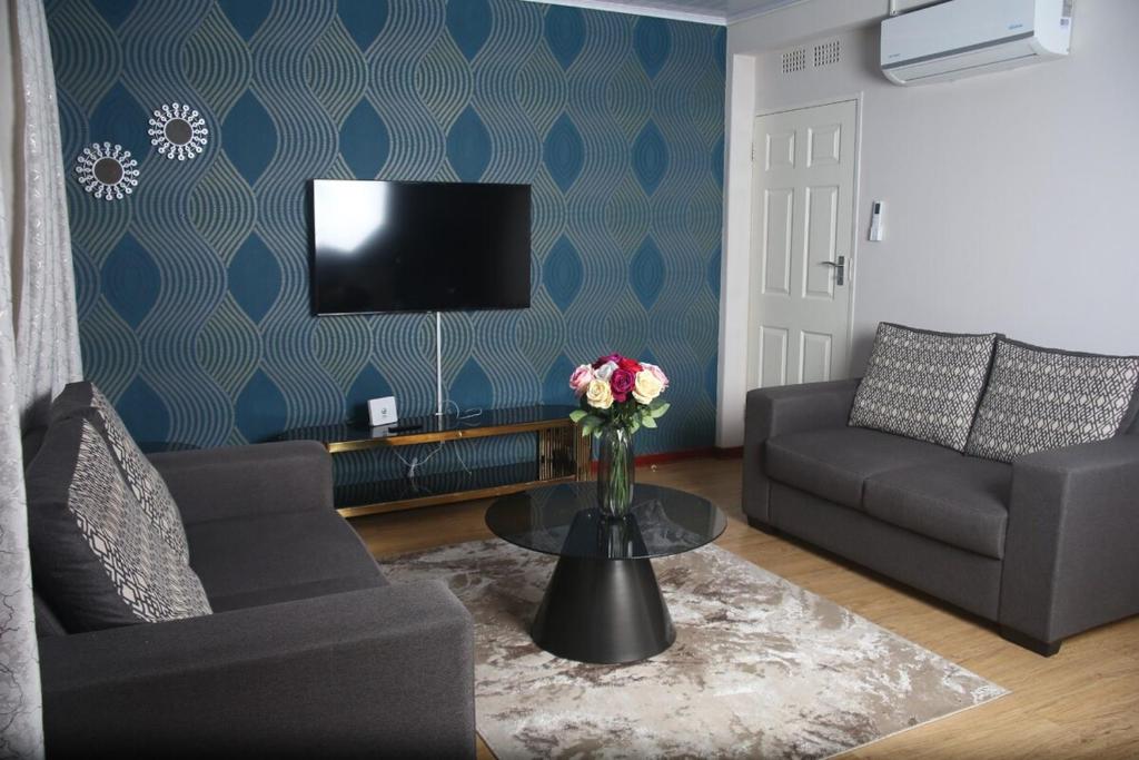 Posezení v ubytování Hillview Comfort Suites