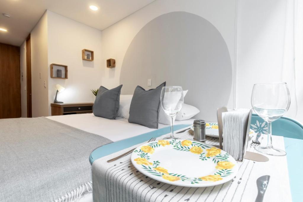 En eller flere senge i et værelse på Loft moderno con excelentes amenities