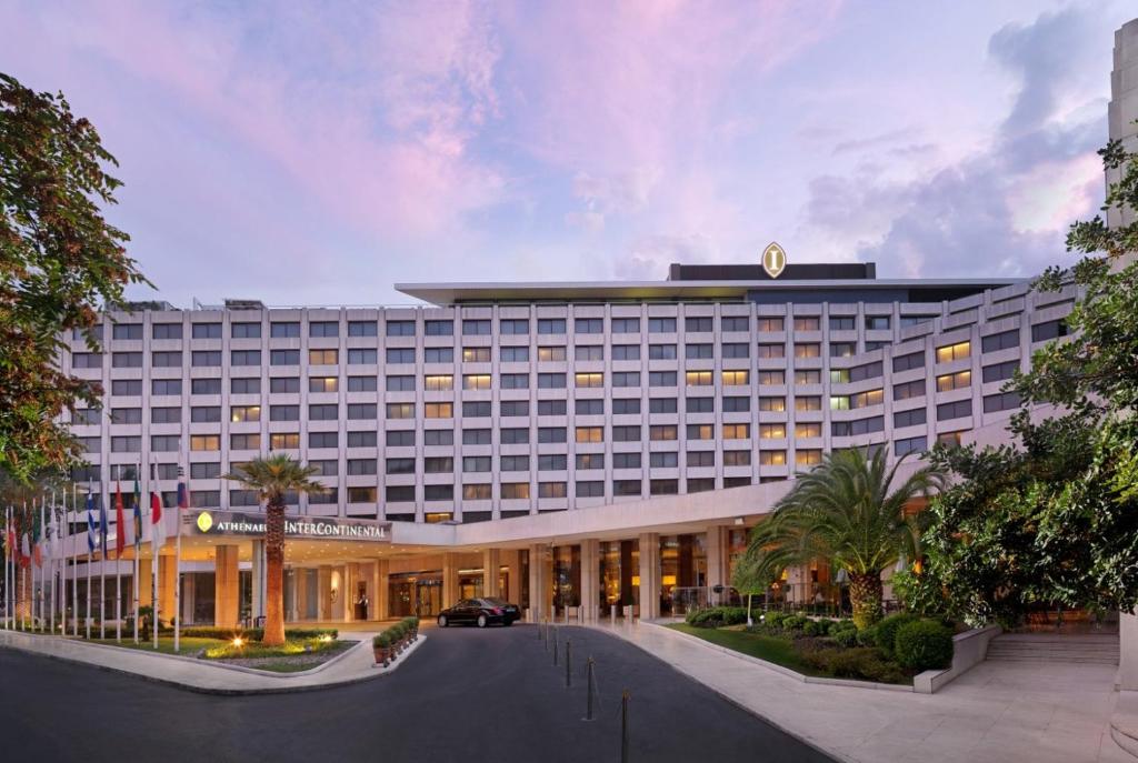 a large hotel building with a street in front of it at InterContinental Athenaeum Athens by IHG in Athens