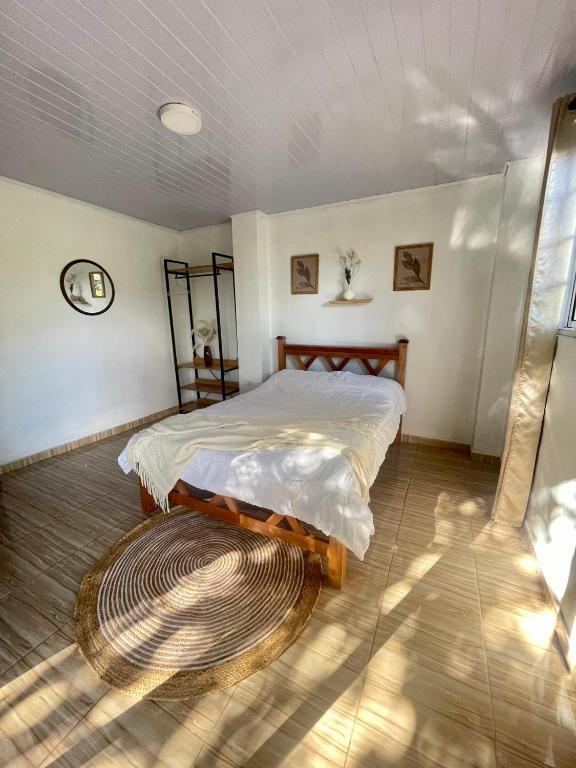 Giường trong phòng chung tại Garden Studio Boquete