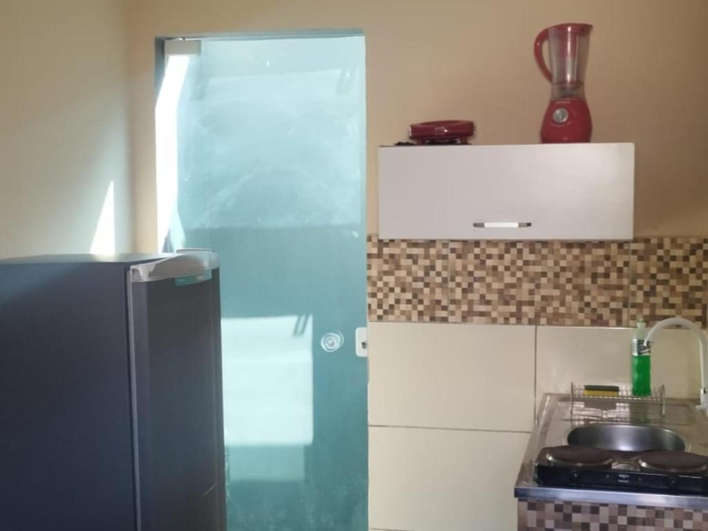 Køkken eller tekøkken på Abaré Slim Suítes