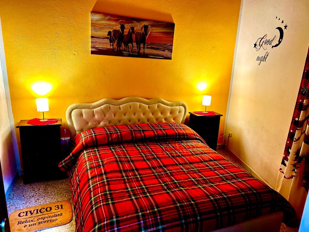 Ένα ή περισσότερα κρεβάτια σε δωμάτιο στο Civico 31