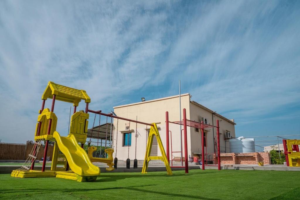 Sân chơi trẻ em tại Eco Paradise Harmony 2BHK Nature Retreat