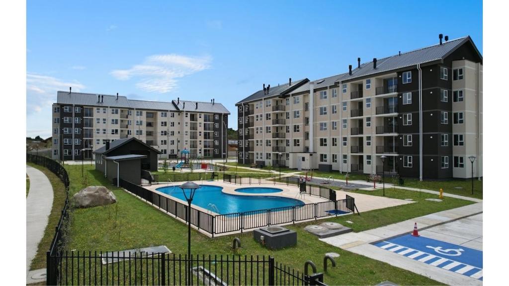 Bazén v ubytování Departamento piscina y estacionamiento en condominio Villarrica nebo v jeho okolí