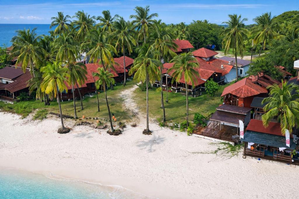an aerial view of a resort on a beach at Redang Divers Resort in Redang Island
