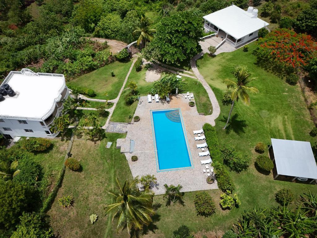 an aerial view of a resort with a swimming pool at Casa Blanca Samaná - Las Galeras in Las Galeras