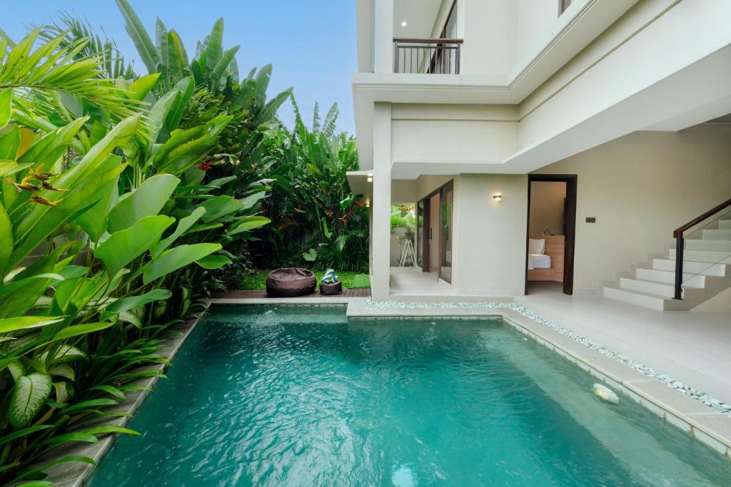 a pool in the backyard of a villa at Uma Dauh Villa - Cemagi in Munggu