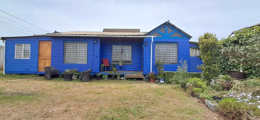 En have udenfor Cabaña por Quintero