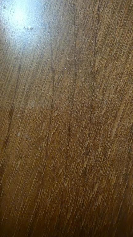 Nahaufnahme einer braunen Holzoberfläche in der Unterkunft Casa Tunja in Tunja