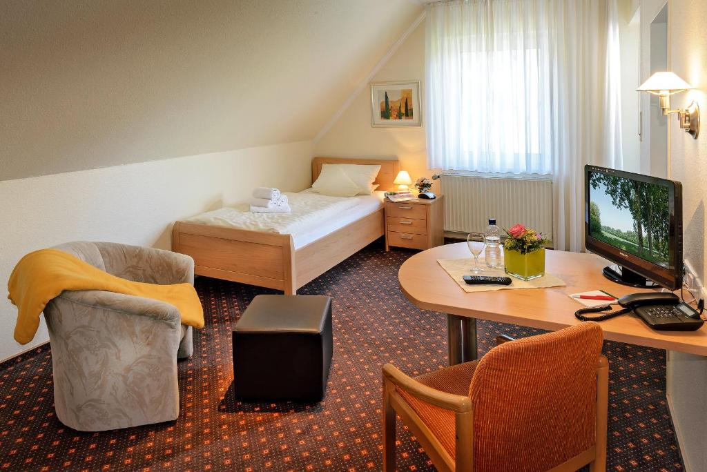 TV a/nebo společenská místnost v ubytování Hotel-Pension Pöhling