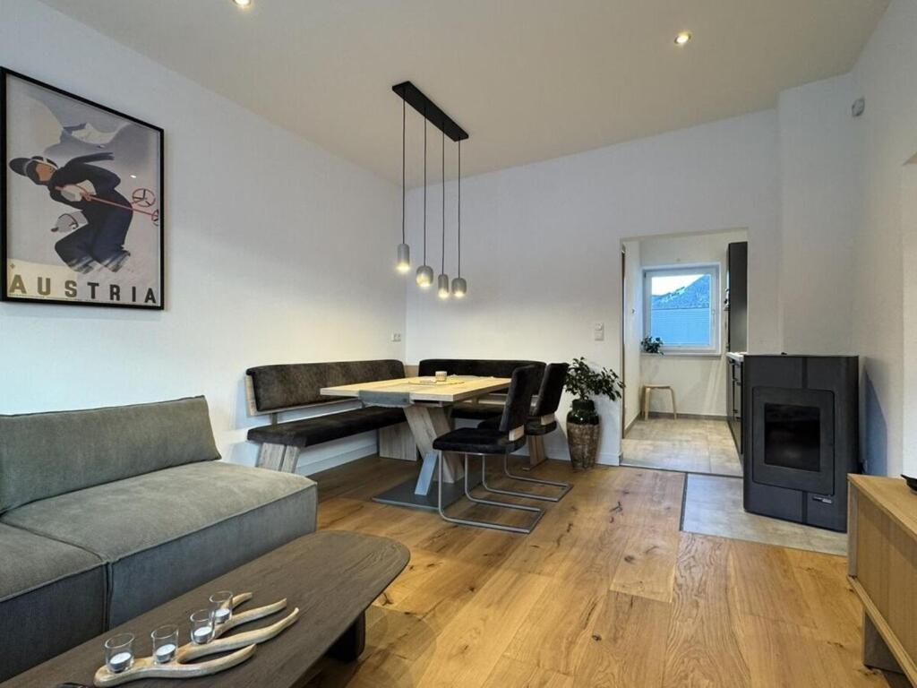 Posezení v ubytování Lucy s Studio Apartment Kössen