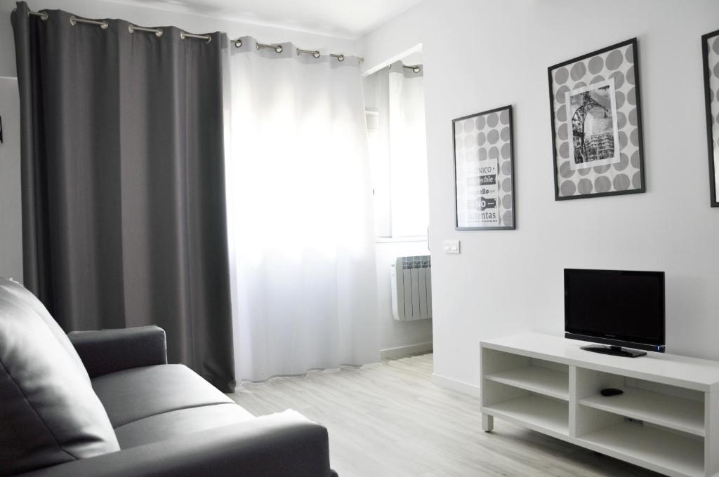 Televízia a/alebo spoločenská miestnosť v ubytovaní Residencia Universitaria Resa La Ciutadella