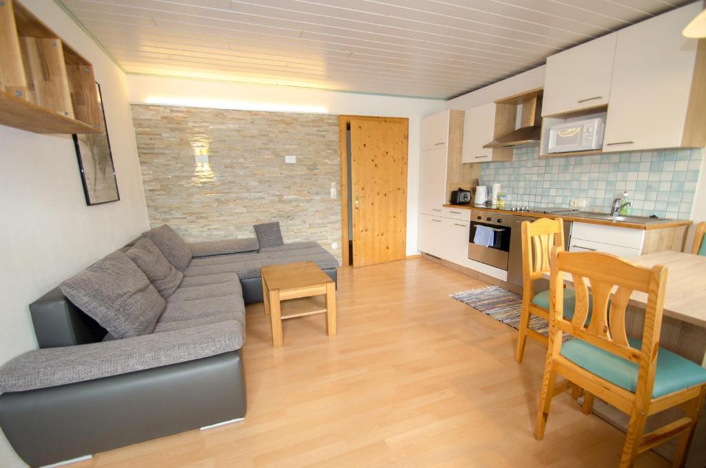 A kitchen or kitchenette at Appartementhaus LAKE VIEW by All in One Apartments
