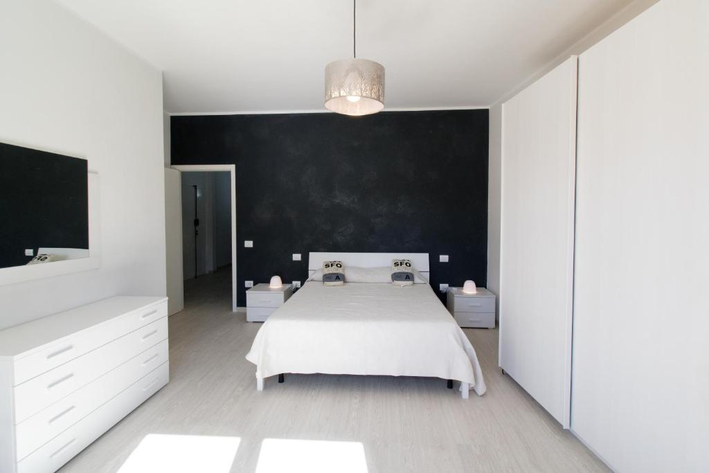 Posteľ alebo postele v izbe v ubytovaní Casa Roncalli