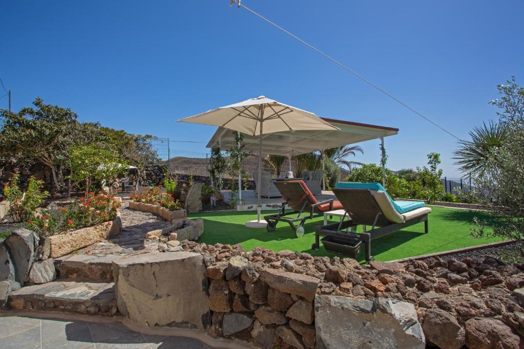 Swimmingpoolen hos eller tæt på Mi casita de Chimaca