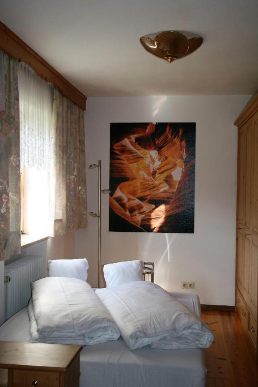 Postel nebo postele na pokoji v ubytování Ferienwohnung Jauß