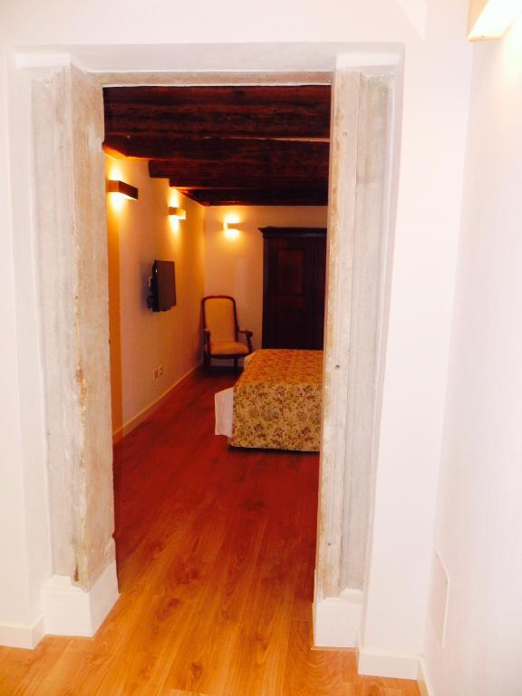 A bed or beds in a room at Home Venice Apartments-Rialto 1 - 2 - 3