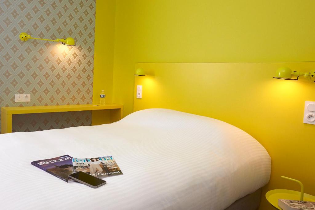 Postel nebo postele na pokoji v ubytování Coto Hotel