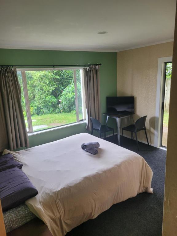 Giường trong phòng chung tại Villa in Bellevue