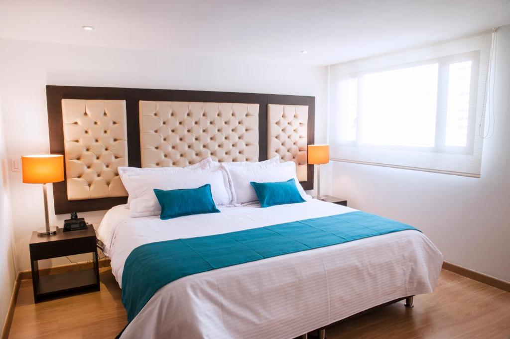 Postel nebo postele na pokoji v ubytování Hotel Grand Park