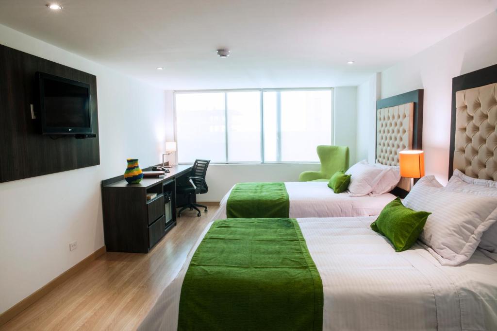 Postel nebo postele na pokoji v ubytování Hotel Grand Park