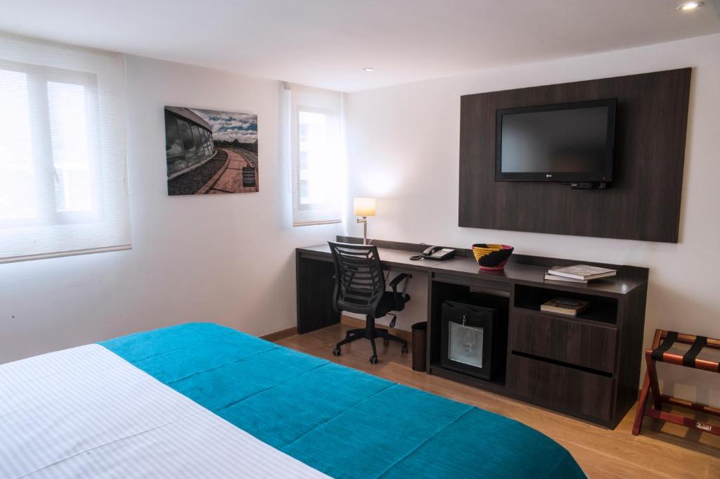 TV a/nebo společenská místnost v ubytování Hotel Grand Park