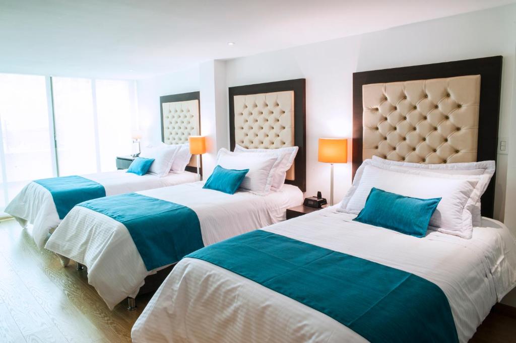 Postel nebo postele na pokoji v ubytování Hotel Grand Park