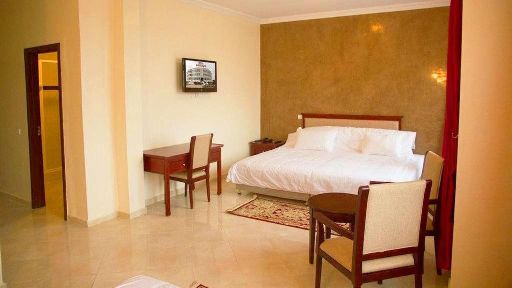 Postel nebo postele na pokoji v ubytování Hotel Angle Atlas & Spa