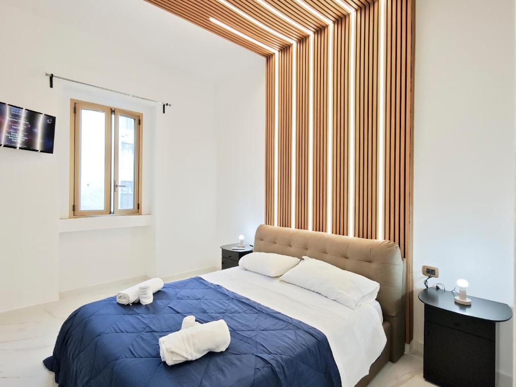 Postel nebo postele na pokoji v ubytování Nicolai Lounge Loft