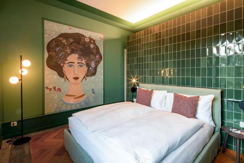 Ένα ή περισσότερα κρεβάτια σε δωμάτιο στο Aare Lodge Attisholz Self Check-in